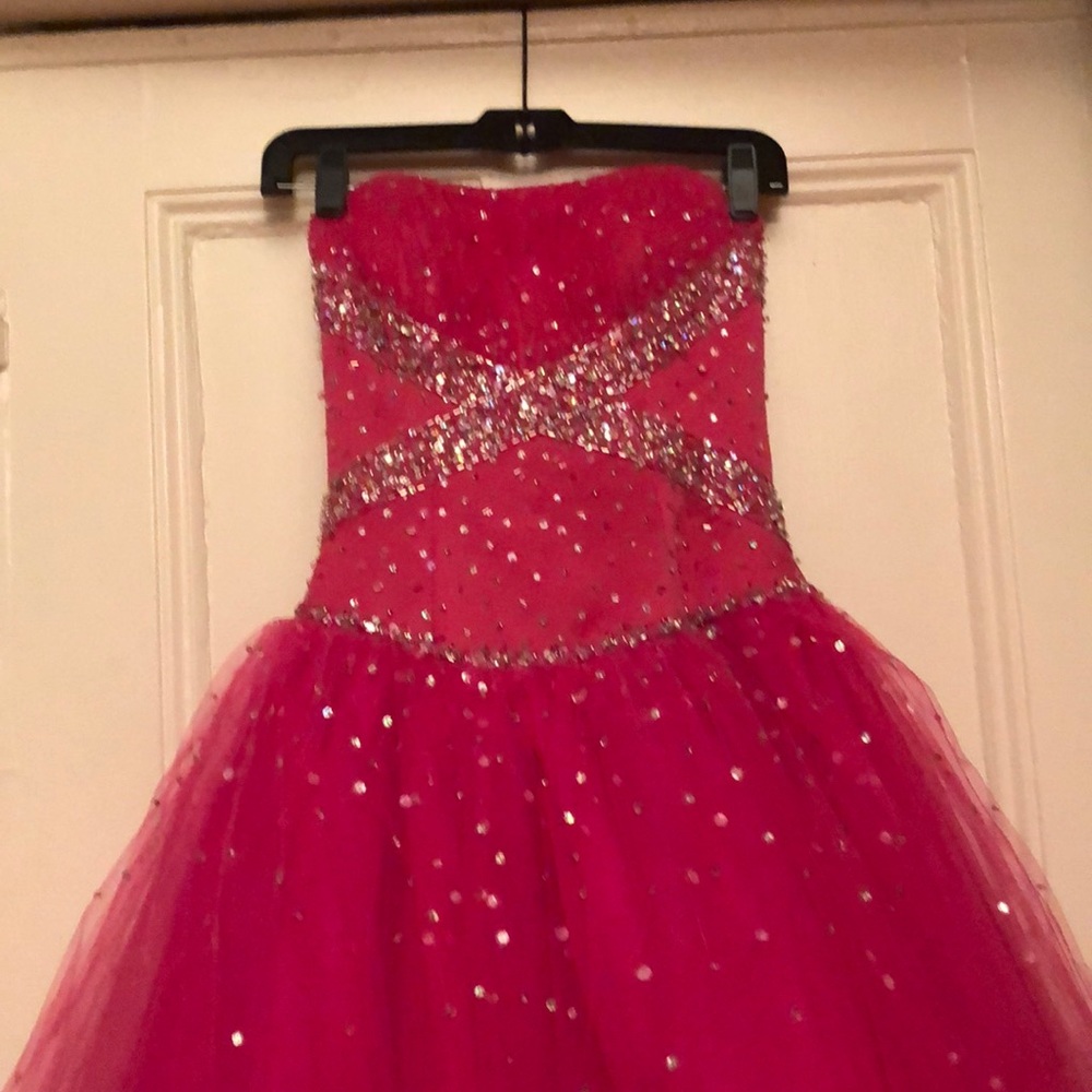 Pink corseted, sequenced, toulle princess gown